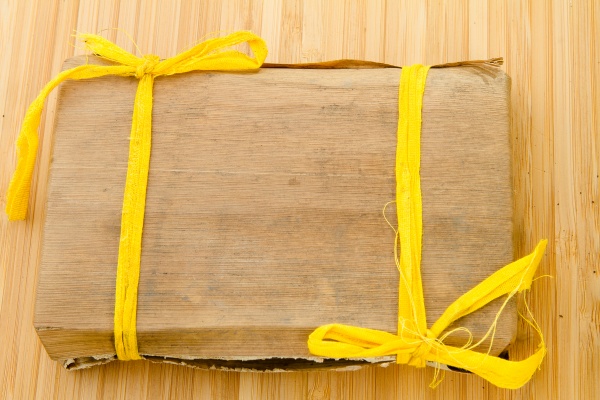Фотография Пуэр плитка в бамбуковом листе №1. Шу. 250 г